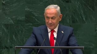תמונה של הגנרל סולימאני מול נתניהו באומות המאוחדות