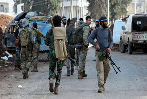Syrians take to streets nationwide against shrine desecration; HTS militants fire on protesters